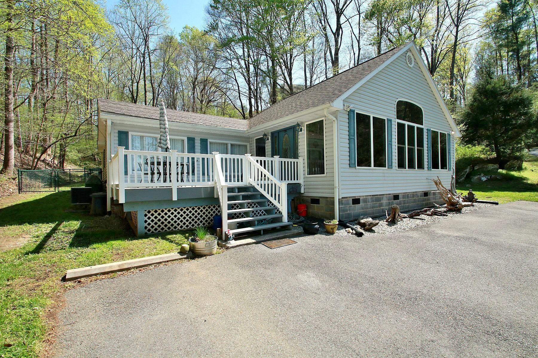5965 Horseshoe Bend Road Goodview, VA 24095 - Photo 8 of 33 front view of a house with a porch