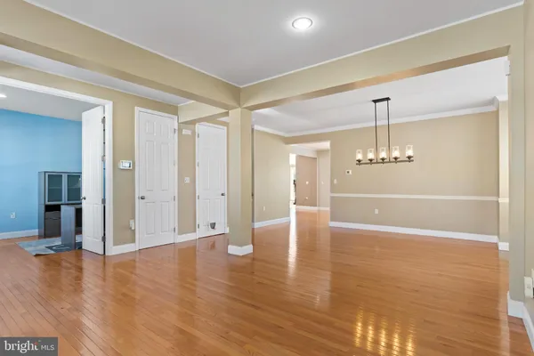 a view of a livingroom with wooden floor