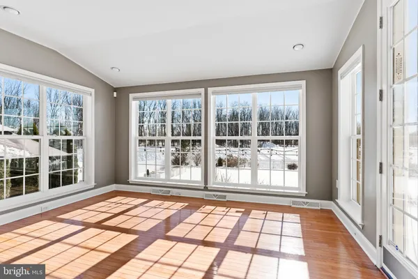 a view of a room with windows