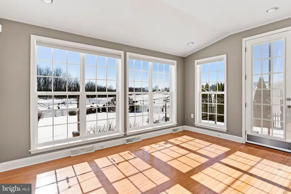 a view of a room with windows