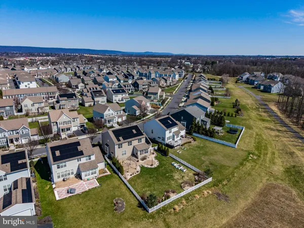 an aerial view of a house with a garden