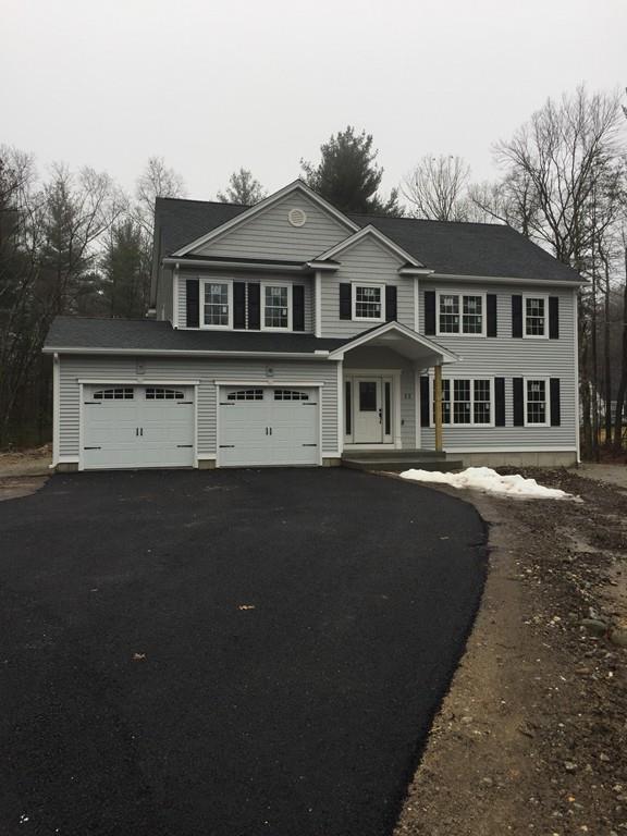 Lot 12 Crow Hill Road Monson, MA 01057 - Photo 1 of 19 a front view of a house with a yard