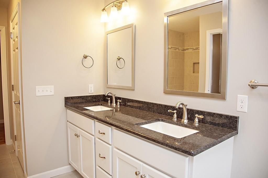Lot 12 Crow Hill Road Monson, MA 01057 - Photo 11 of 19 a bathroom with a granite countertop sink and a mirror