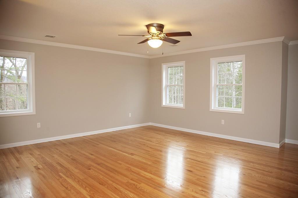 Lot 12 Crow Hill Road Monson, MA 01057 - Photo 9 of 19 a view of an empty room with wooden floor and a window