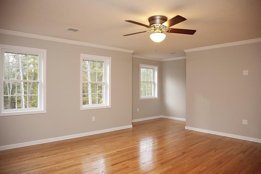 Lot 12 Crow Hill Road Monson, MA 01057 - Photo 10 of 19 a view of an empty room with wooden floor and a window