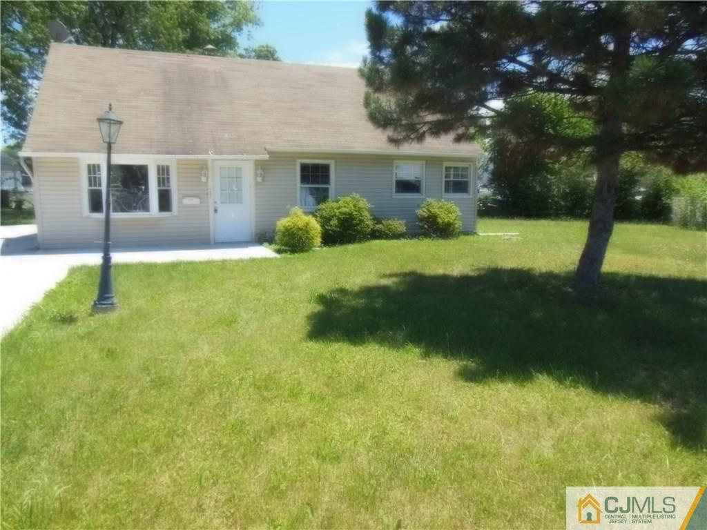 133 Idlewild Road Edison, NJ 08817 - Photo 1 of 11 a view of house with backyard and garden