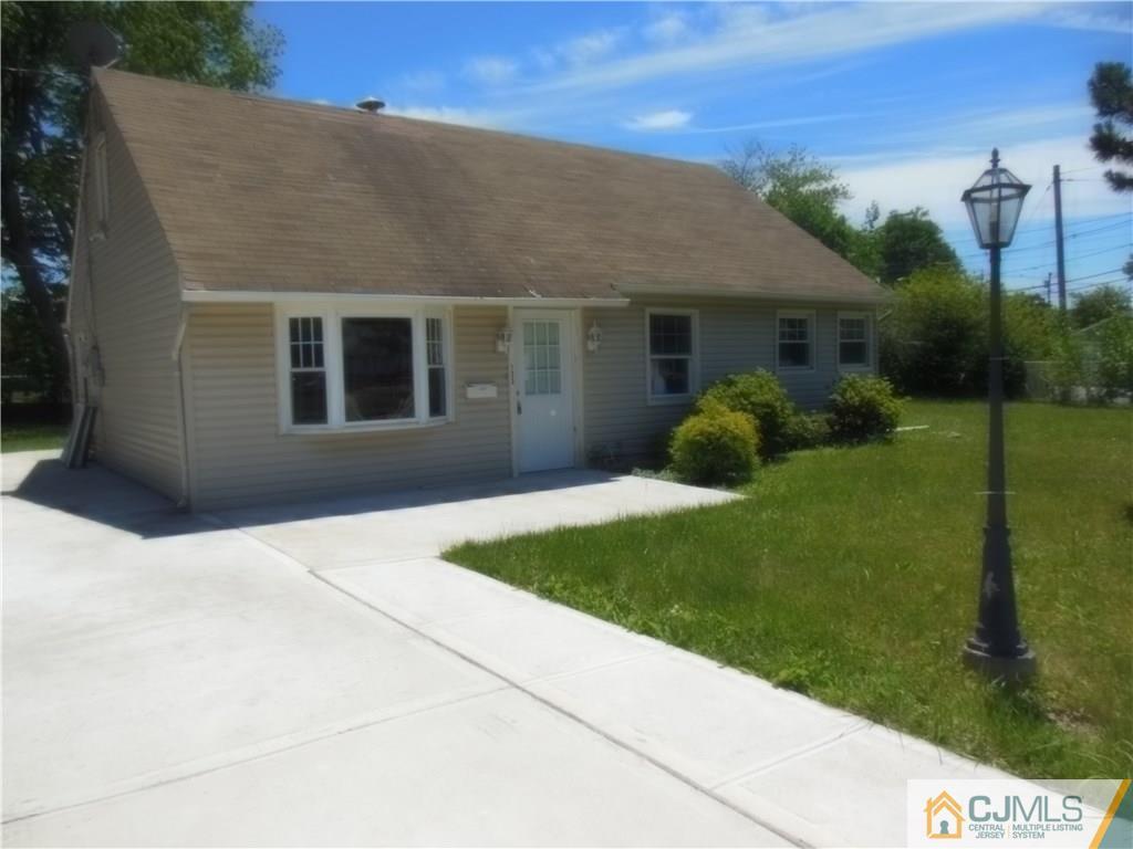 133 Idlewild Road Edison, NJ 08817 - Photo 2 of 11 a house view with a garden space