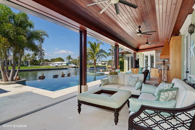 645 Inlet Road North Palm Beach, FL 33408 - Photo 20 of 35 a living room with furniture and a large window