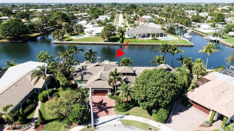 645 Inlet Road North Palm Beach, FL 33408 - Photo 28 of 35 an aerial view of a house with a lake view