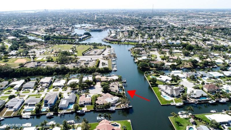 645 Inlet Road North Palm Beach, FL 33408 - Photo 31 of 35 an aerial view of residential houses with outdoor space