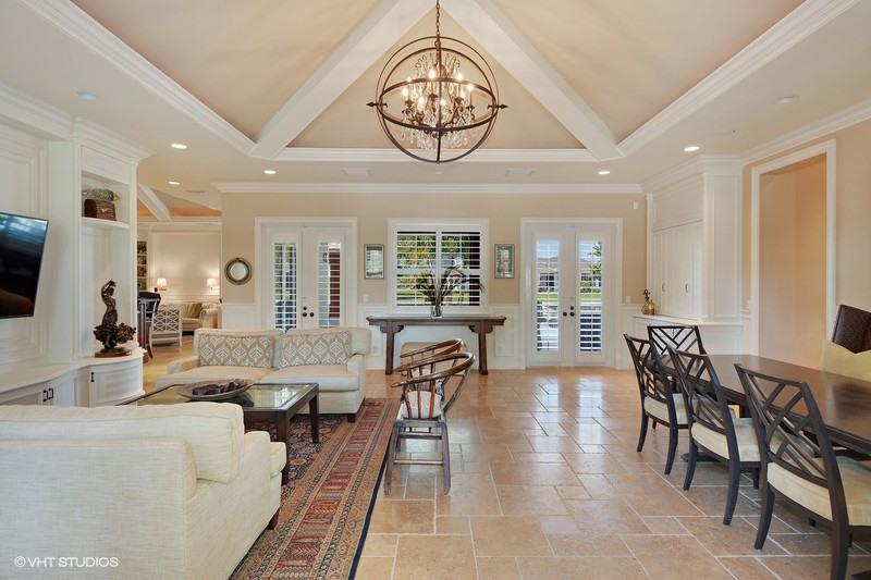 645 Inlet Road North Palm Beach, FL 33408 - Photo 4 of 35 a view of a dining room with furniture window and wooden floor