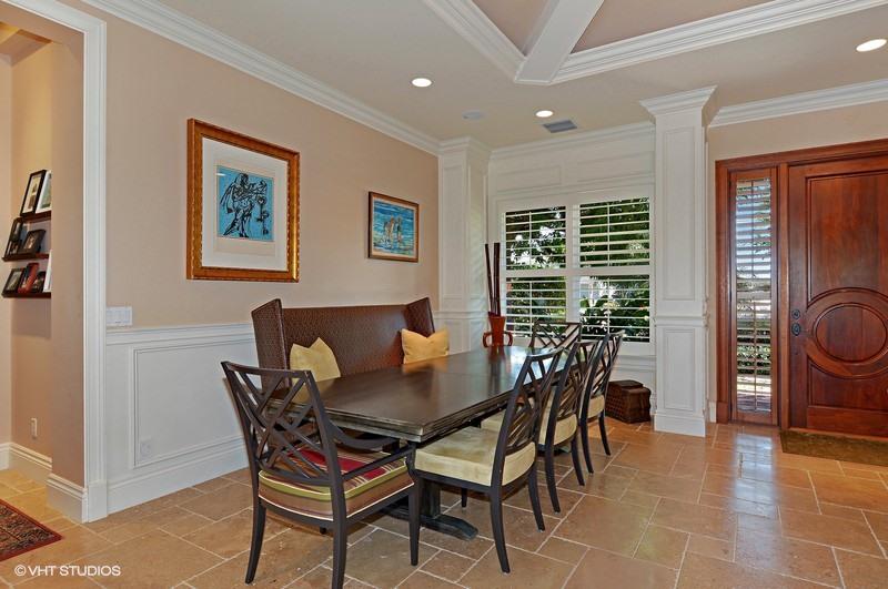 645 Inlet Road North Palm Beach, FL 33408 - Photo 7 of 35 a view of a dining room with furniture and wooden floor