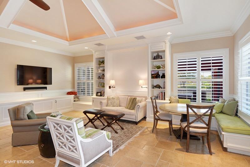645 Inlet Road North Palm Beach, FL 33408 - Photo 8 of 35 a living room with furniture and a flat screen tv