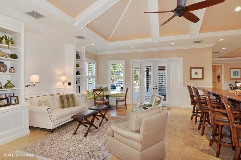 645 Inlet Road North Palm Beach, FL 33408 - Photo 9 of 35 a living room with furniture dining area and a large window