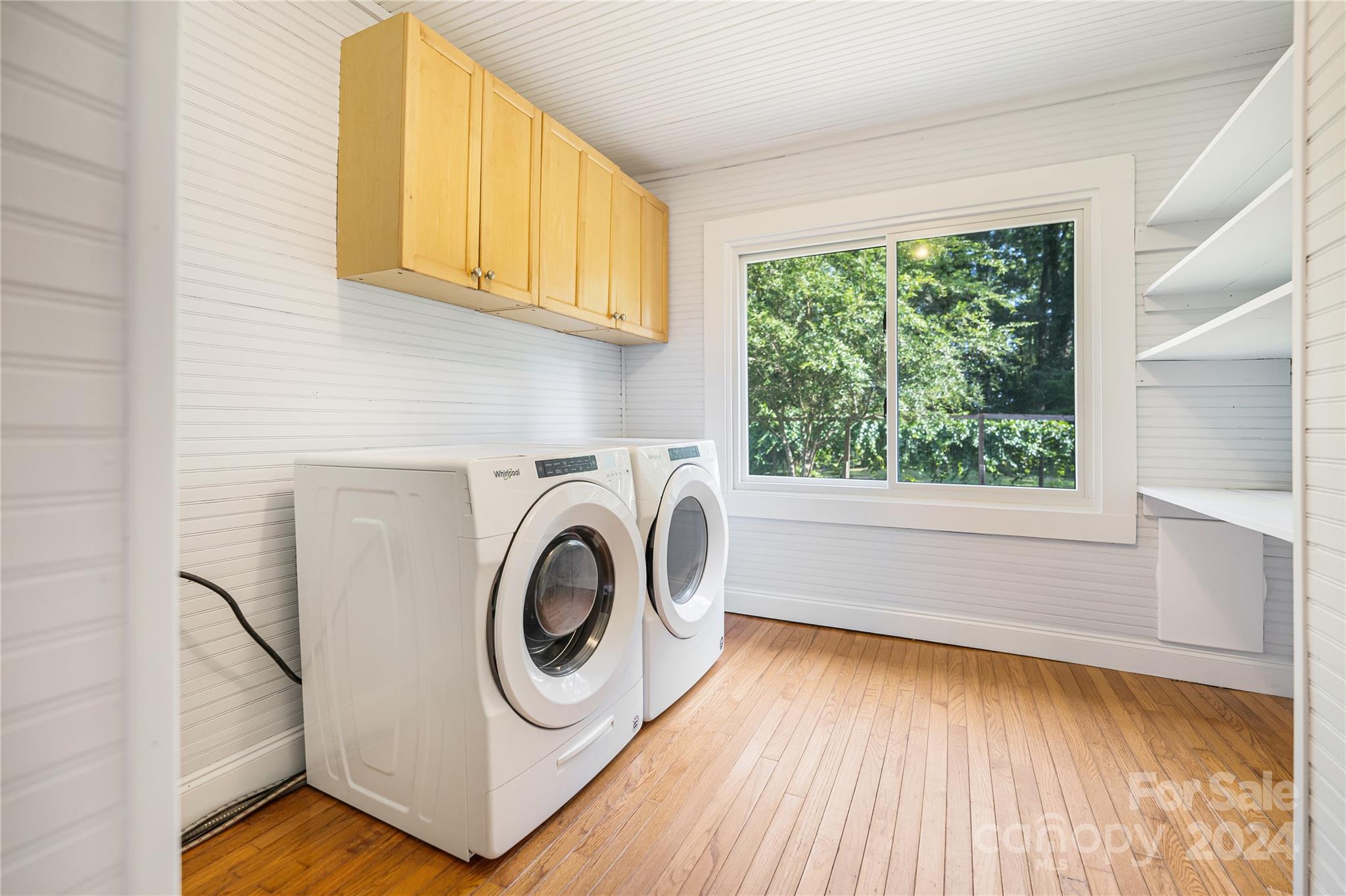 911 Jupiter Road Weaverville, NC 28787 - Photo 18 of 39 a utility room with dryer and washer