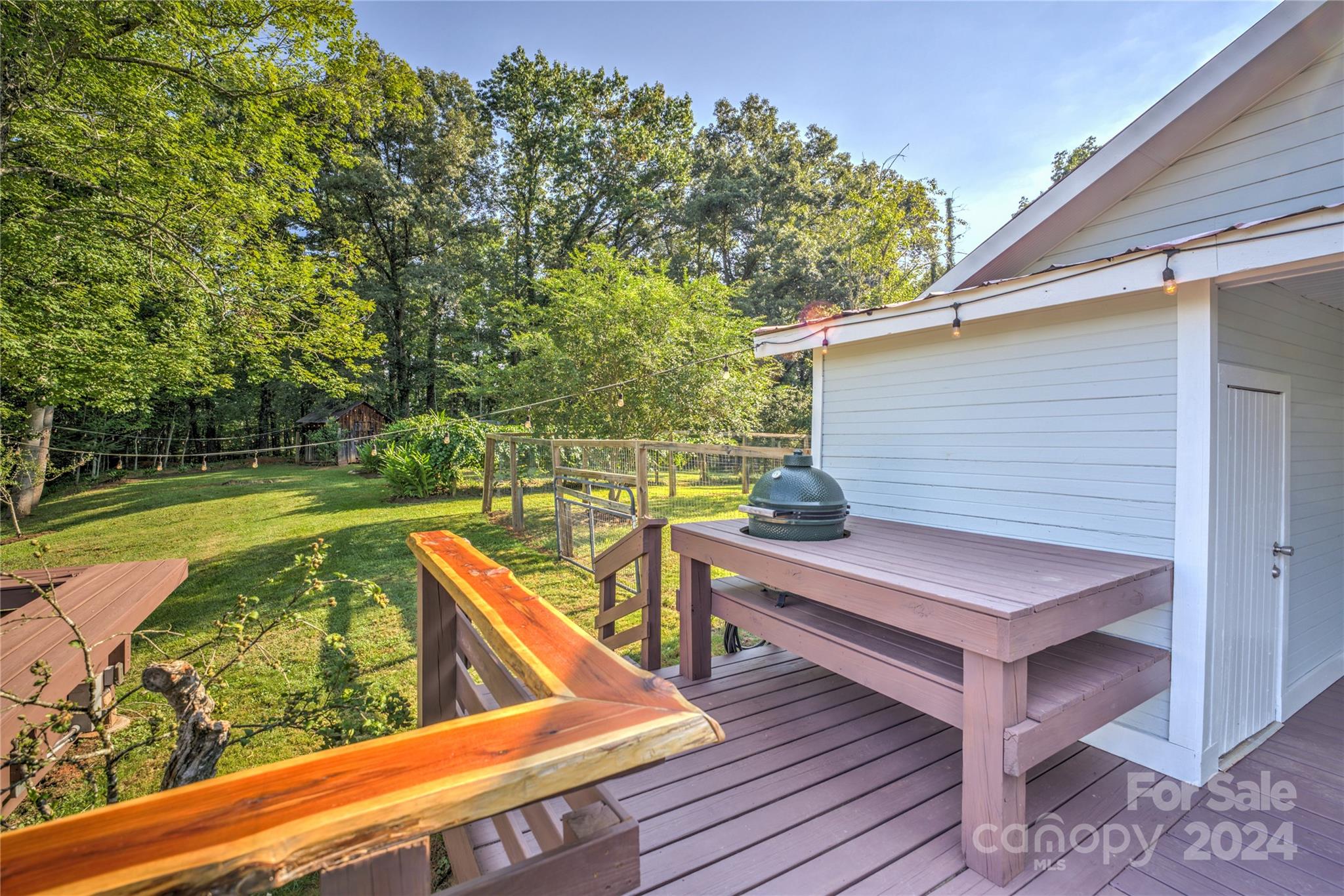 911 Jupiter Road Weaverville, NC 28787 - Photo 25 of 39 a view of a two chairs in the balcony