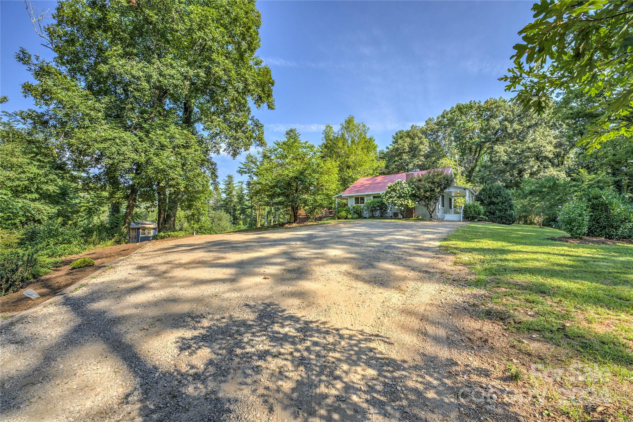 911 Jupiter Road Weaverville, NC 28787 - Photo 33 of 39 a view of a yard with a house