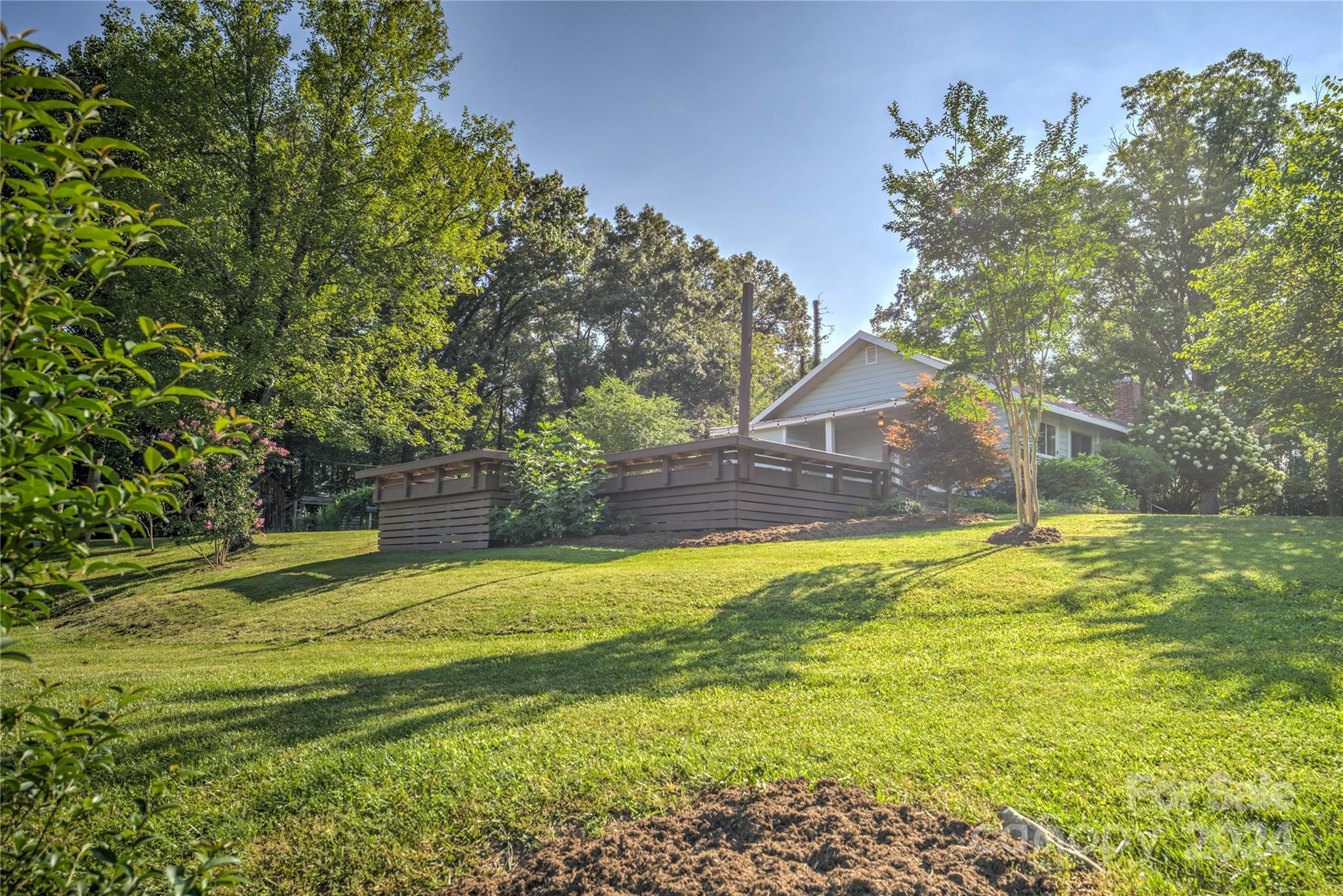 911 Jupiter Road Weaverville, NC 28787 - Photo 38 of 39 a view of a house with a yard