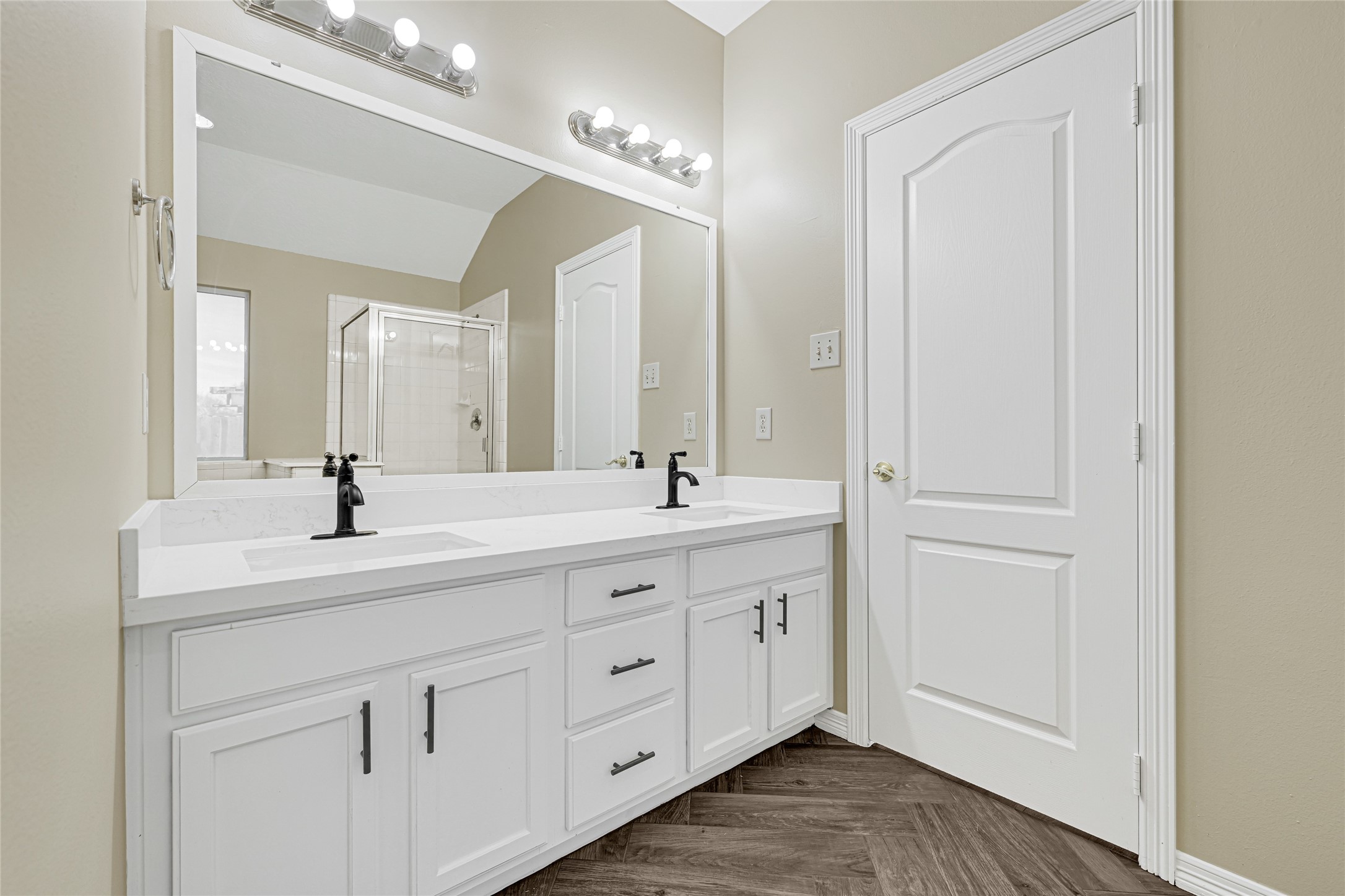 2518 Forge Creek Road Houston, TX 77067 - Photo 18 of 25 a bathroom with a double vanity sink and a mirror