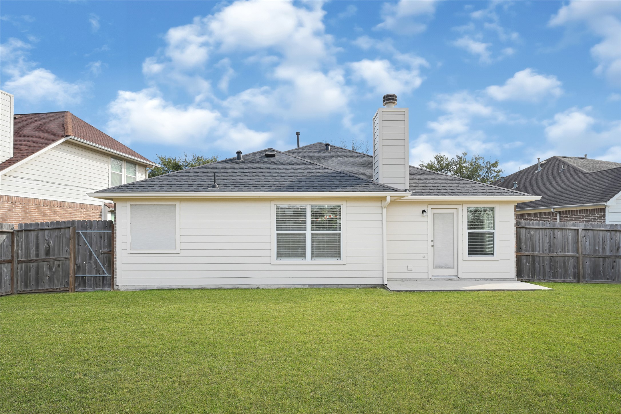 2518 Forge Creek Road Houston, TX 77067 - Photo 24 of 25 a front view of a house with a garden
