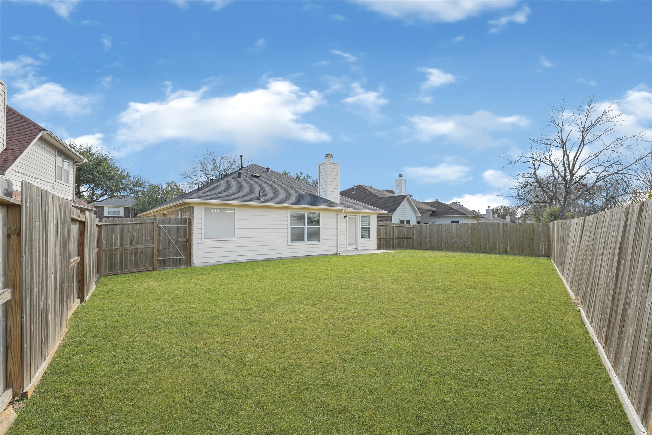 2518 Forge Creek Road Houston, TX 77067 - Photo 25 of 25 a view of an house with backyard and garden