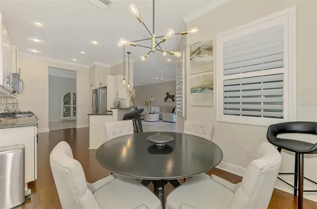 a view of a lake with houses in the background