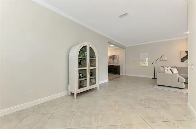 an aerial view of a houses with a yard