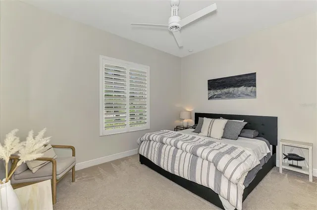 a room with gym equipment and windows