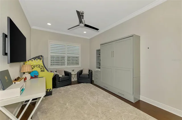 an aerial view of residential house with outdoor space and swimming pool