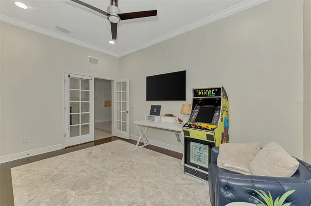 a front view of multi story residential apartment building with yard and green space