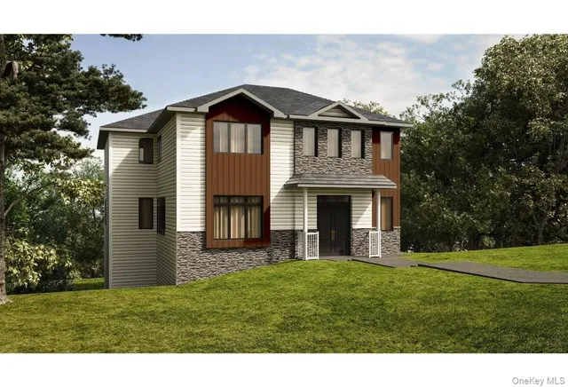 a front view of a house with a garden