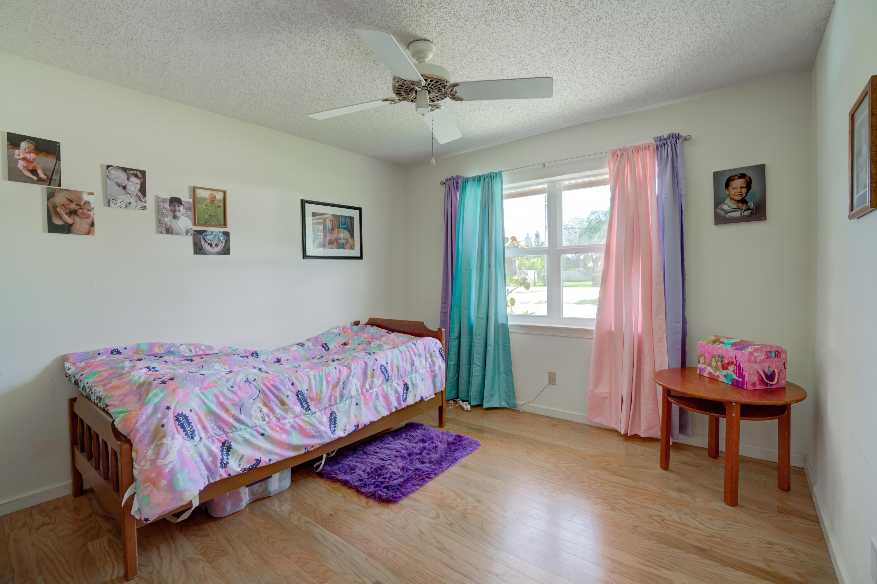 9524 Southeast Cove Point Street Jupiter, FL 33469 - Photo 35 of 58 Guest bedroom