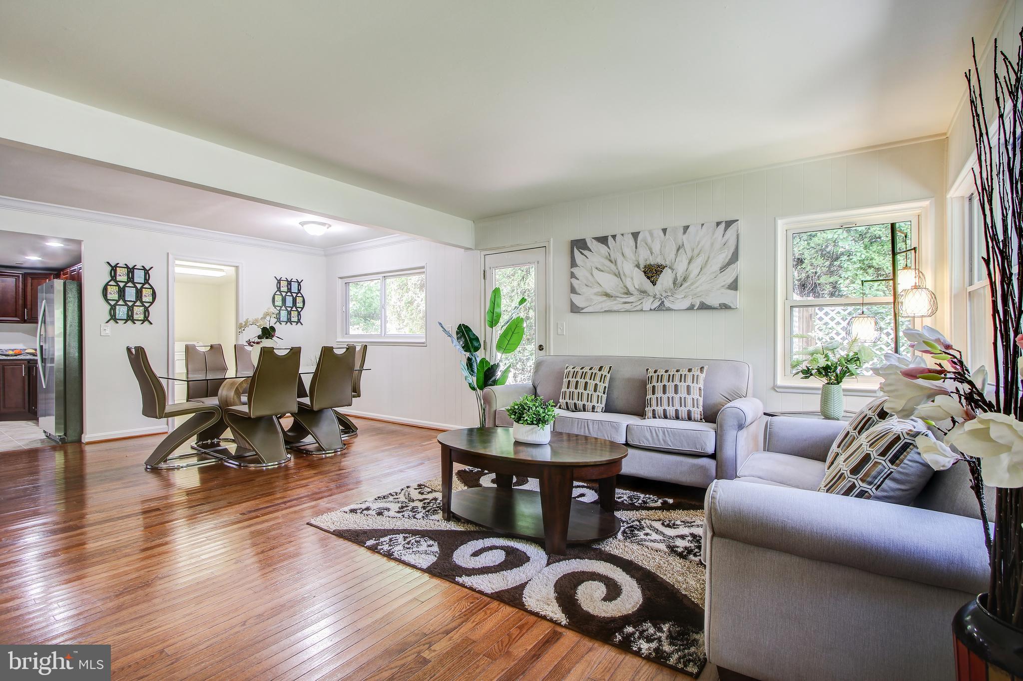 702 Dryden Street Silver Spring, MD 20901 - Photo 2 of 31 a living room with furniture and wooden floor