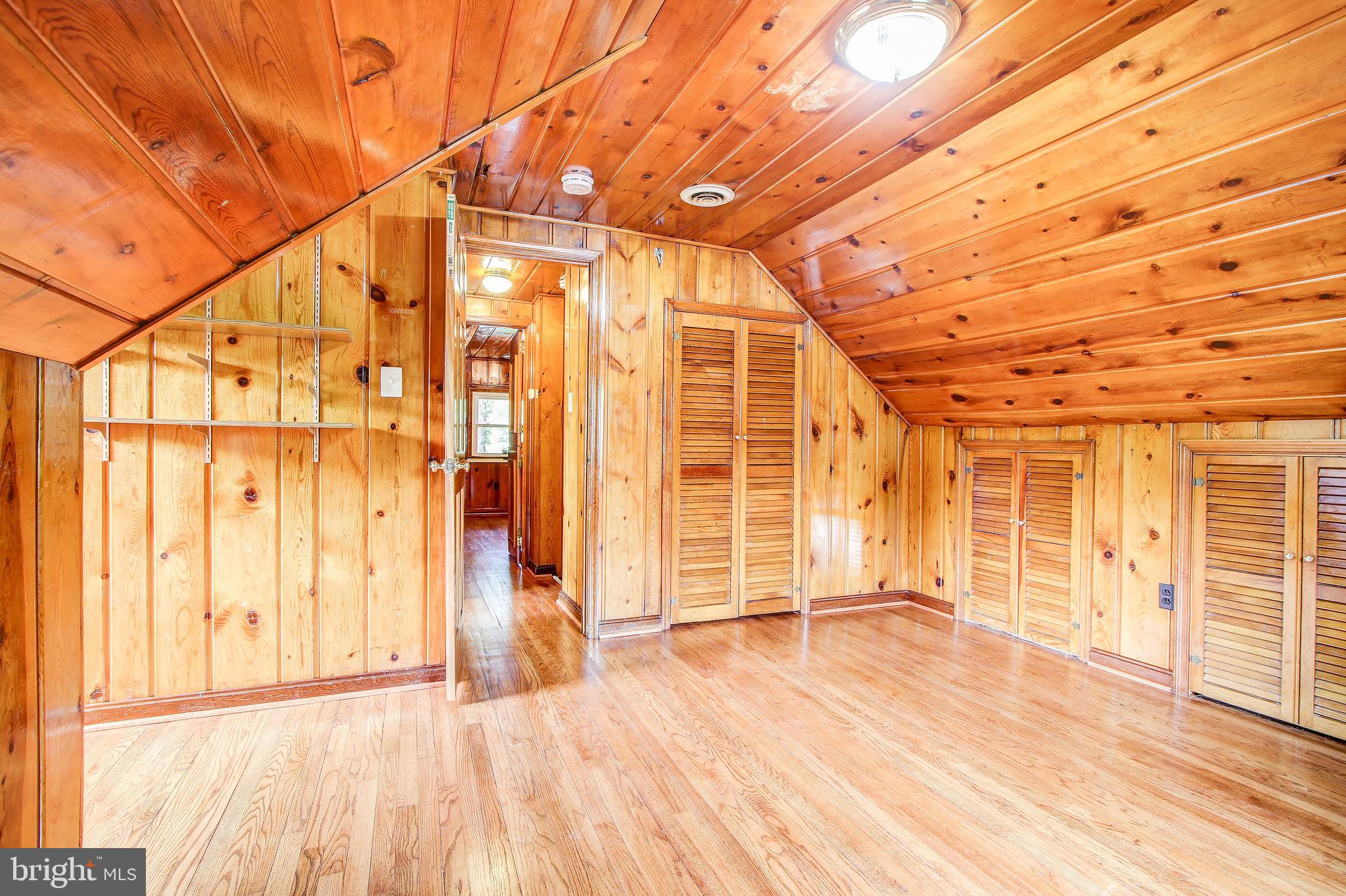702 Dryden Street Silver Spring, MD 20901 - Photo 19 of 31 front view of a room with wooden floor and windows