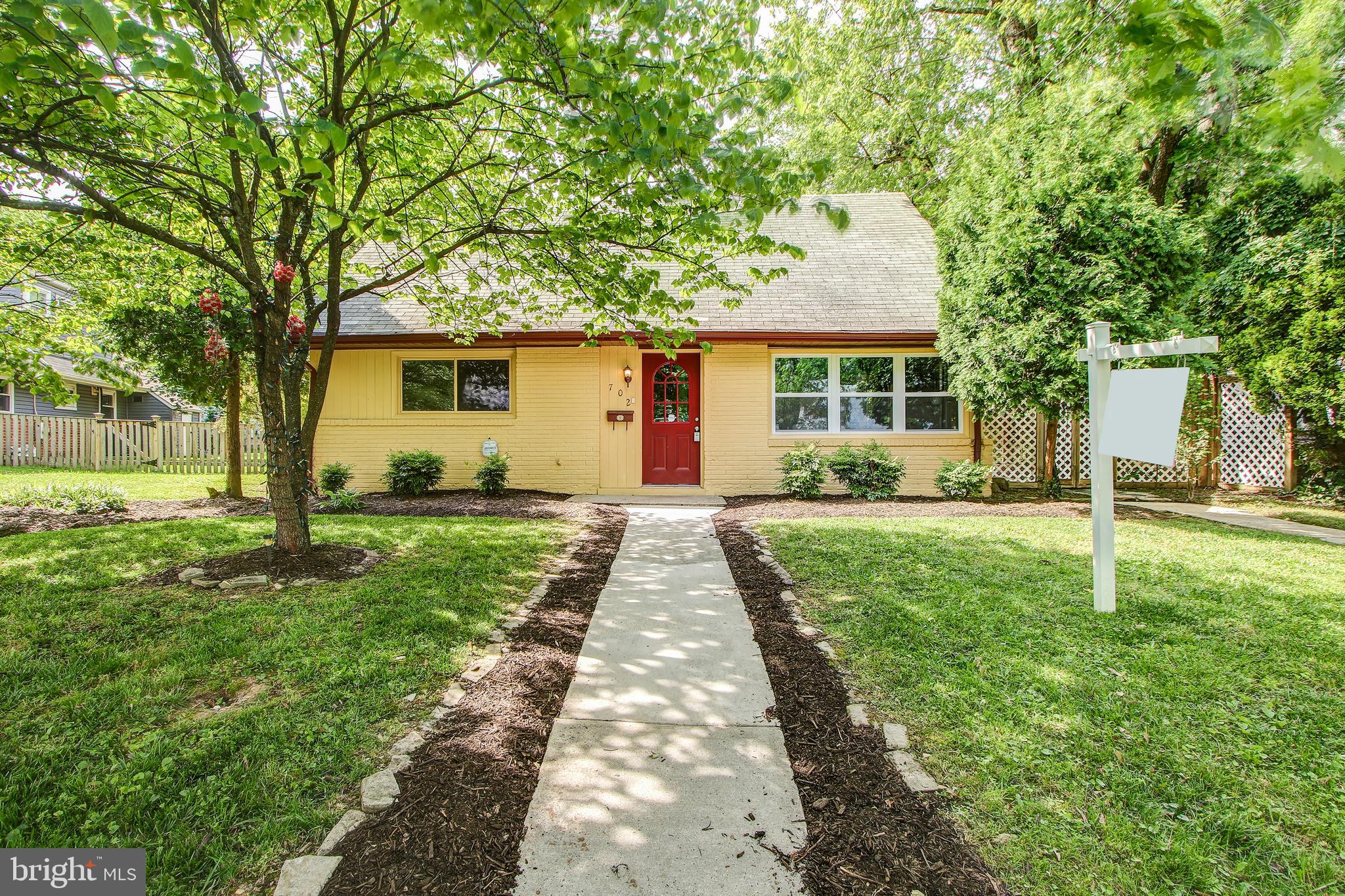 702 Dryden Street Silver Spring, MD 20901 - Photo 24 of 31 a front view of a house with garden