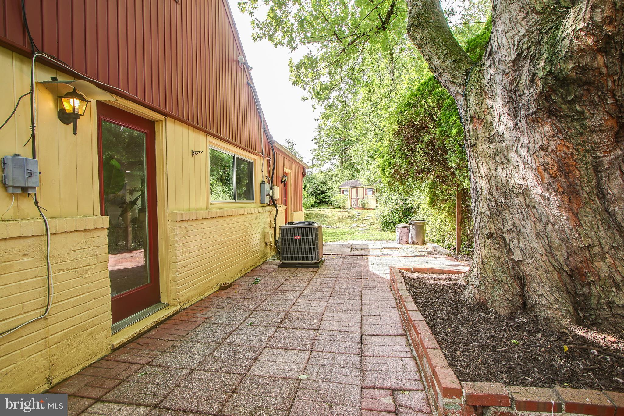 702 Dryden Street Silver Spring, MD 20901 - Photo 26 of 31 a view of a pathway along a building