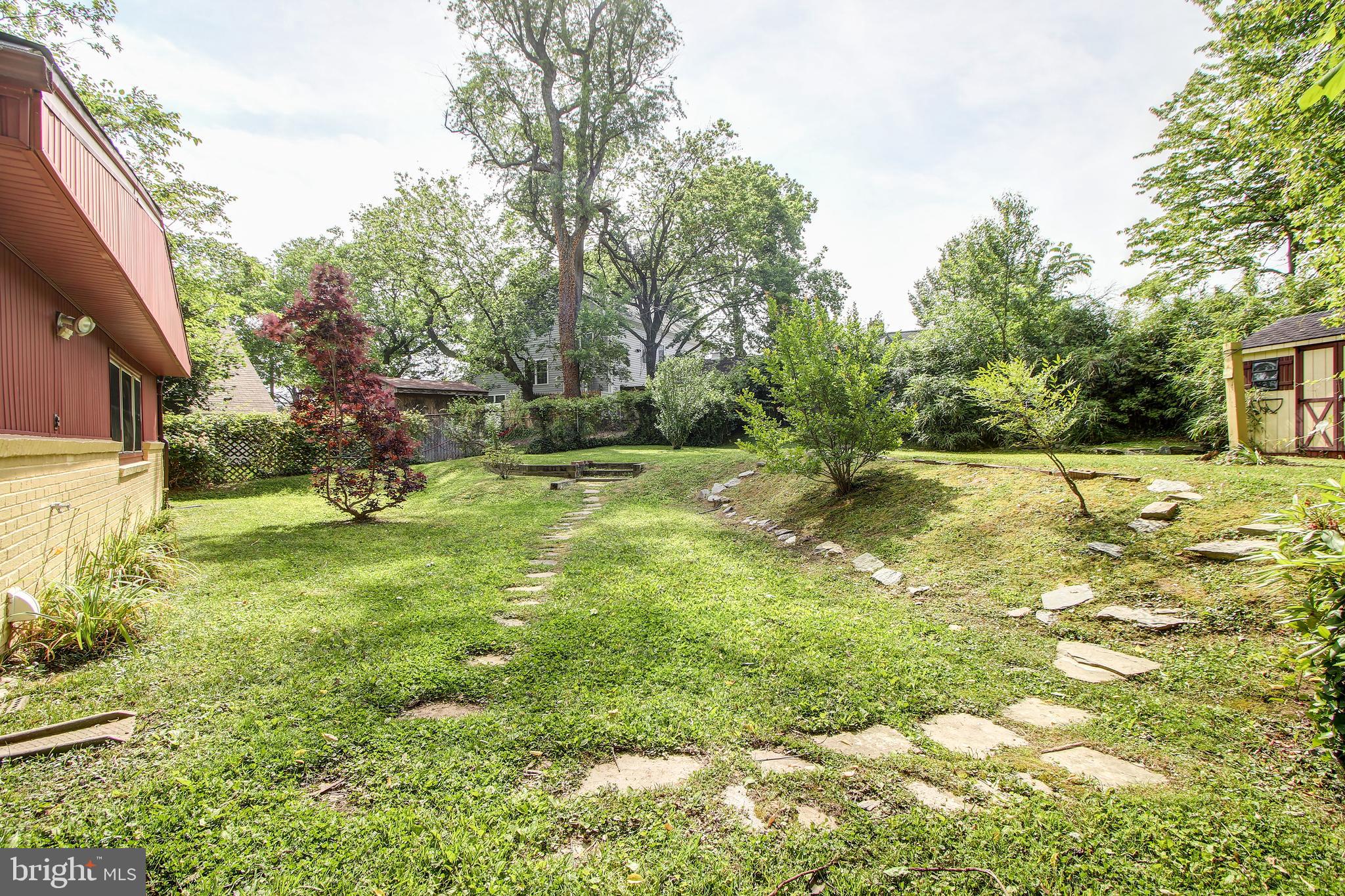 702 Dryden Street Silver Spring, MD 20901 - Photo 27 of 31 a view of a park with large trees