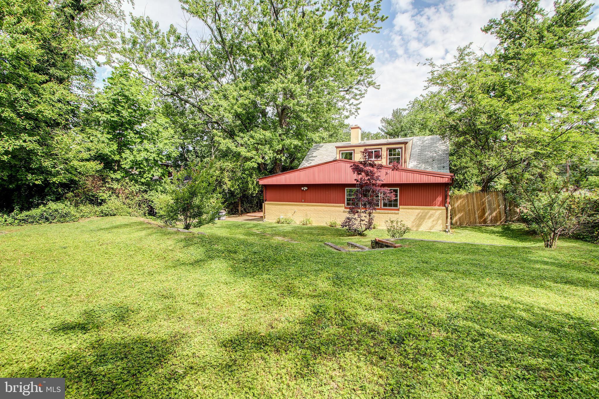 702 Dryden Street Silver Spring, MD 20901 - Photo 29 of 31 a view of a house with a yard balcony and sitting area