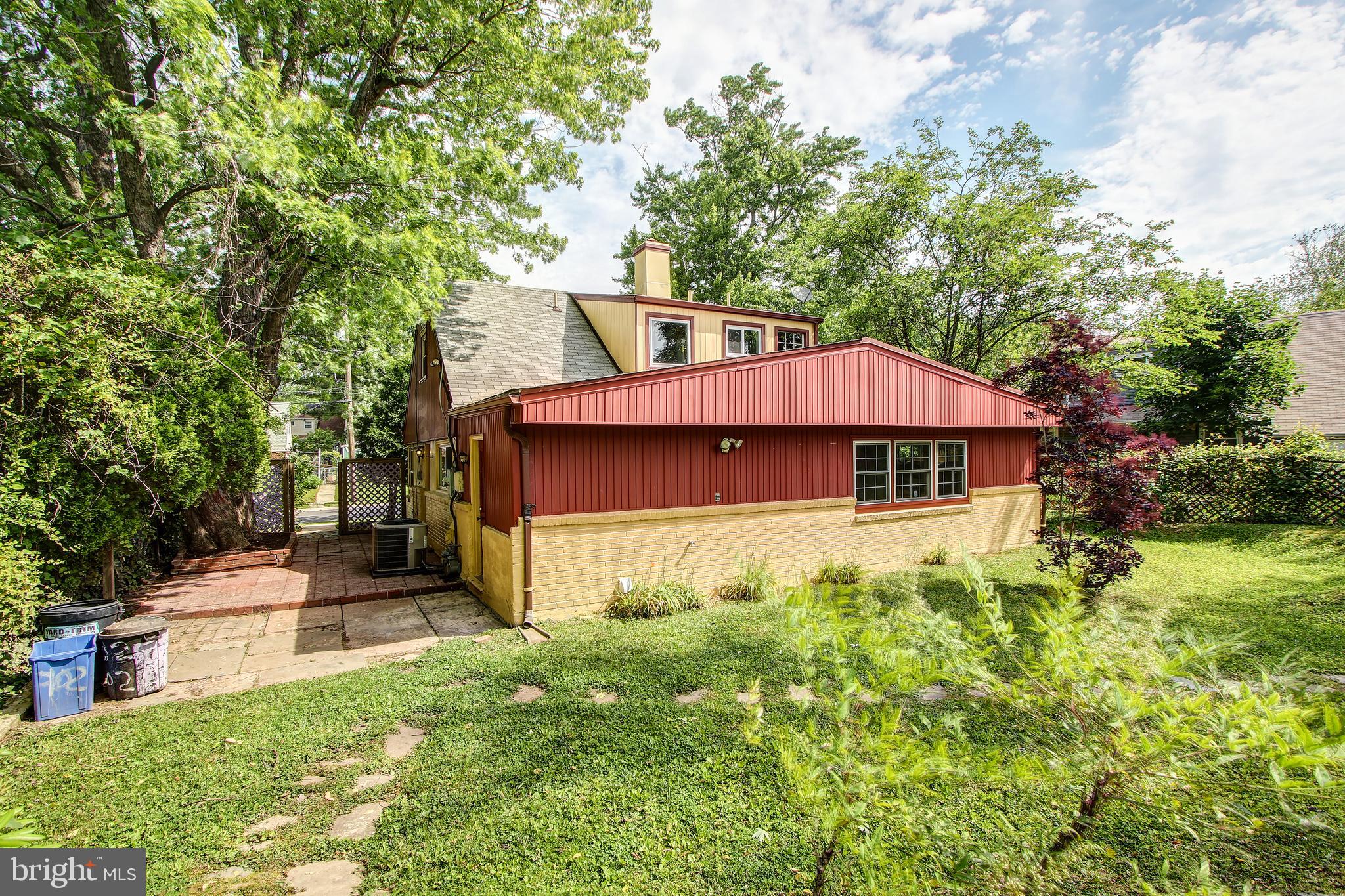 702 Dryden Street Silver Spring, MD 20901 - Photo 31 of 31 a front view of a house with garden
