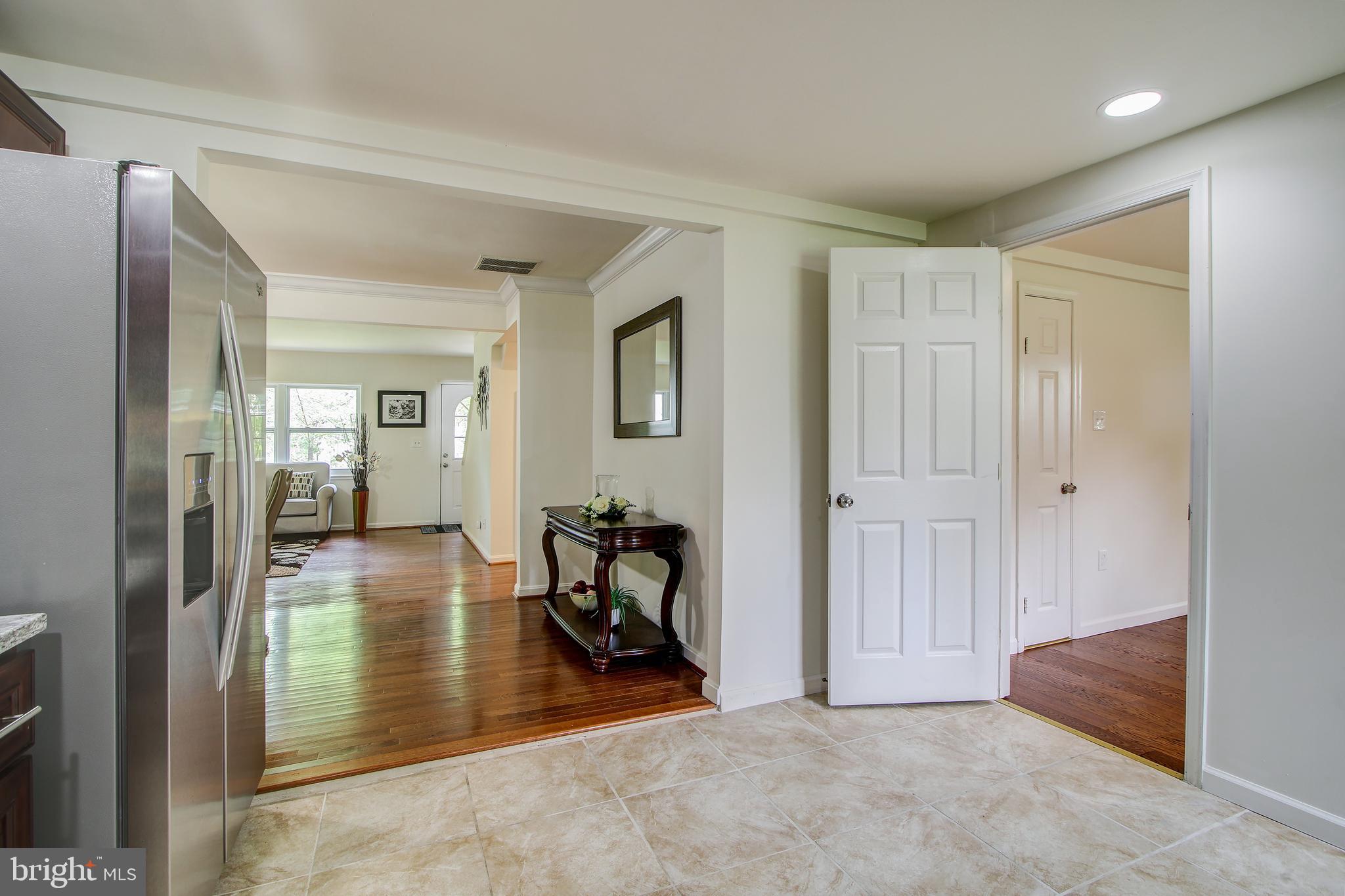 702 Dryden Street Silver Spring, MD 20901 - Photo 9 of 31 a view of a livingroom and a livingroom with furniture