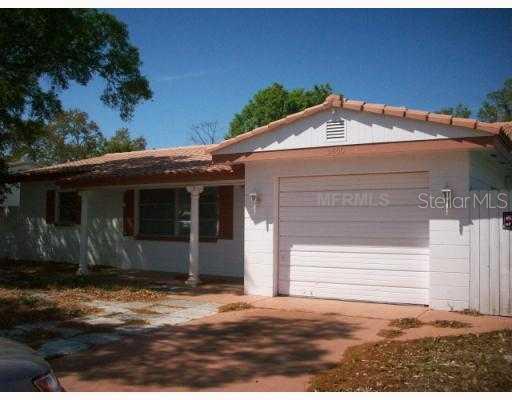 5800 Orange Road Seminole, FL 33772 - Photo 1 of 1 a front view of a house