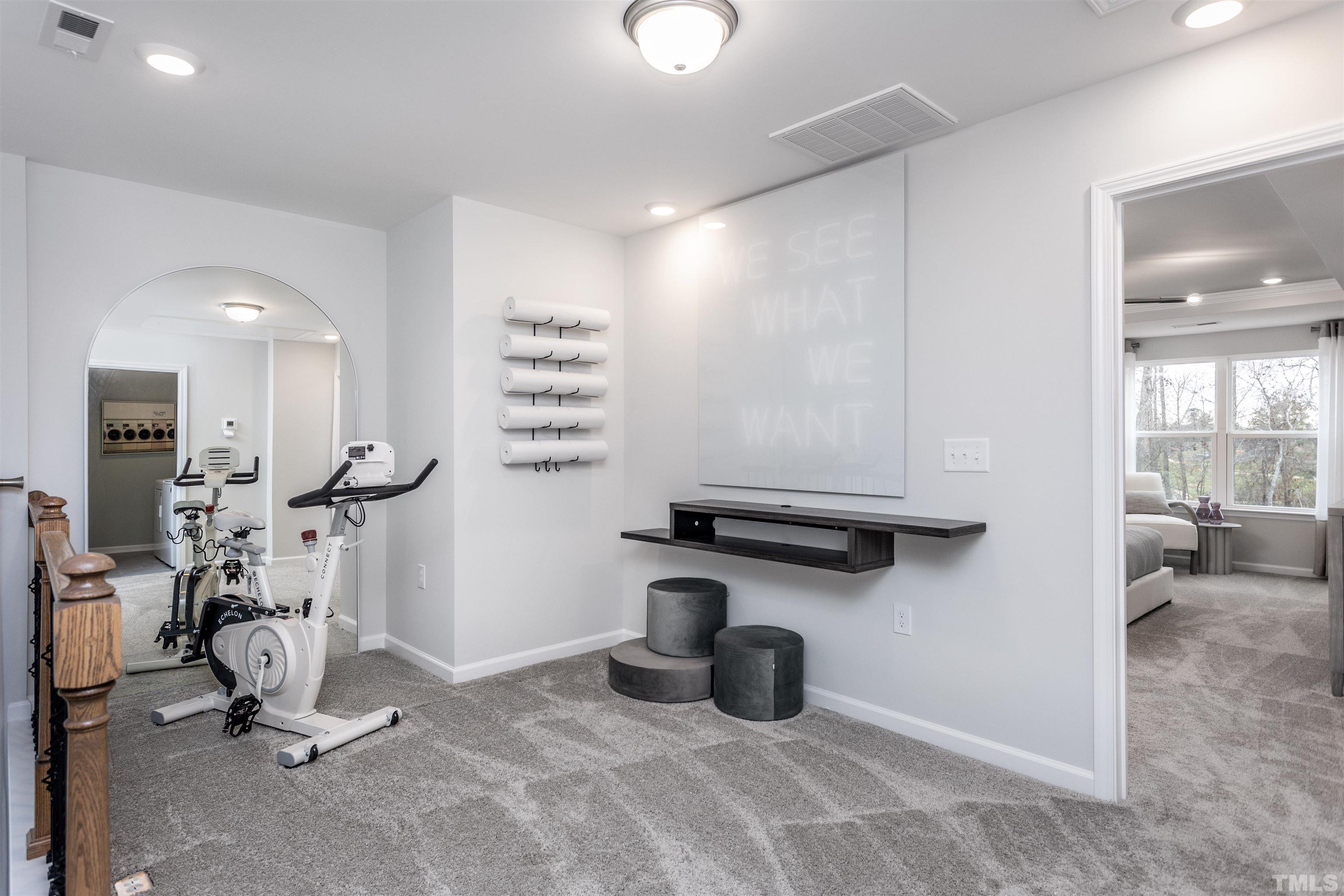 4808 Megara Run Raleigh, NC 27603 - Photo 13 of 23 a view of a room with gym equipment