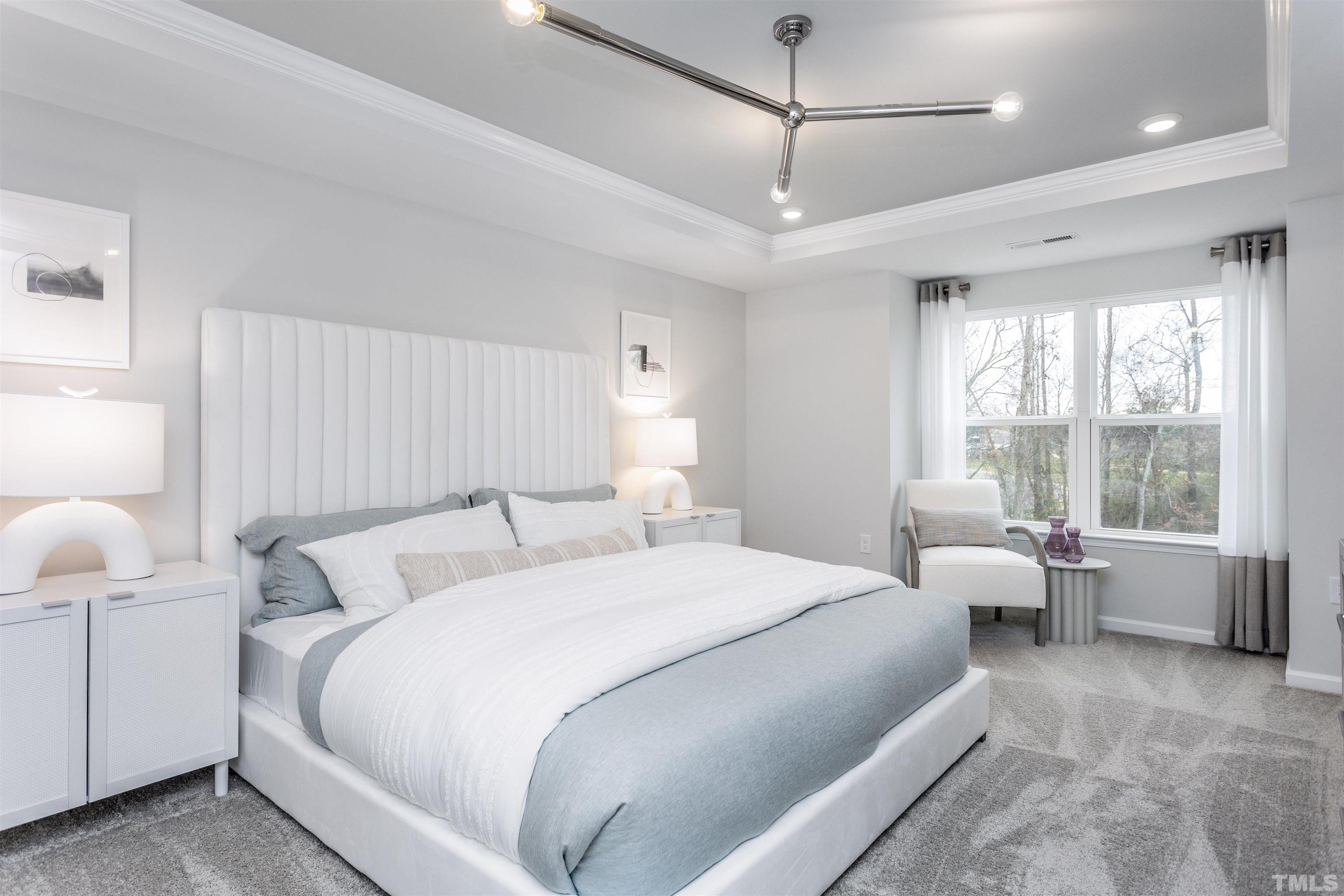 4808 Megara Run Raleigh, NC 27603 - Photo 14 of 23 a bed room with a bed and a large window
