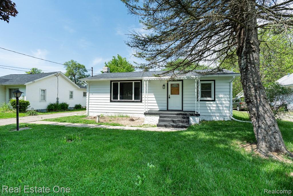 1056 Adams Road Burton, MI 48509 - Photo 1 of 29 New front steps welcome you!