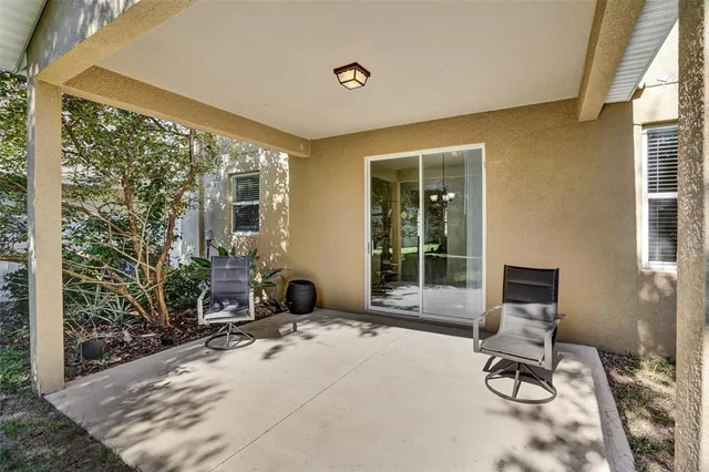 a front view of a house with patio