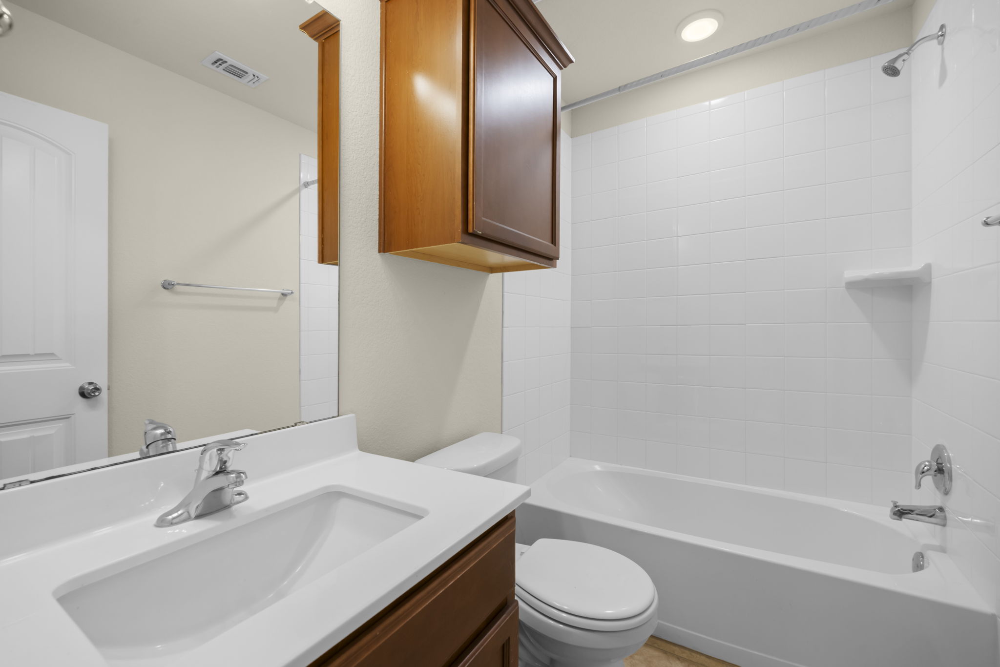 101 Plata Lane Jarrell, TX 76537 - Photo 14 of 27 a bathroom with a sink a toilet and shower