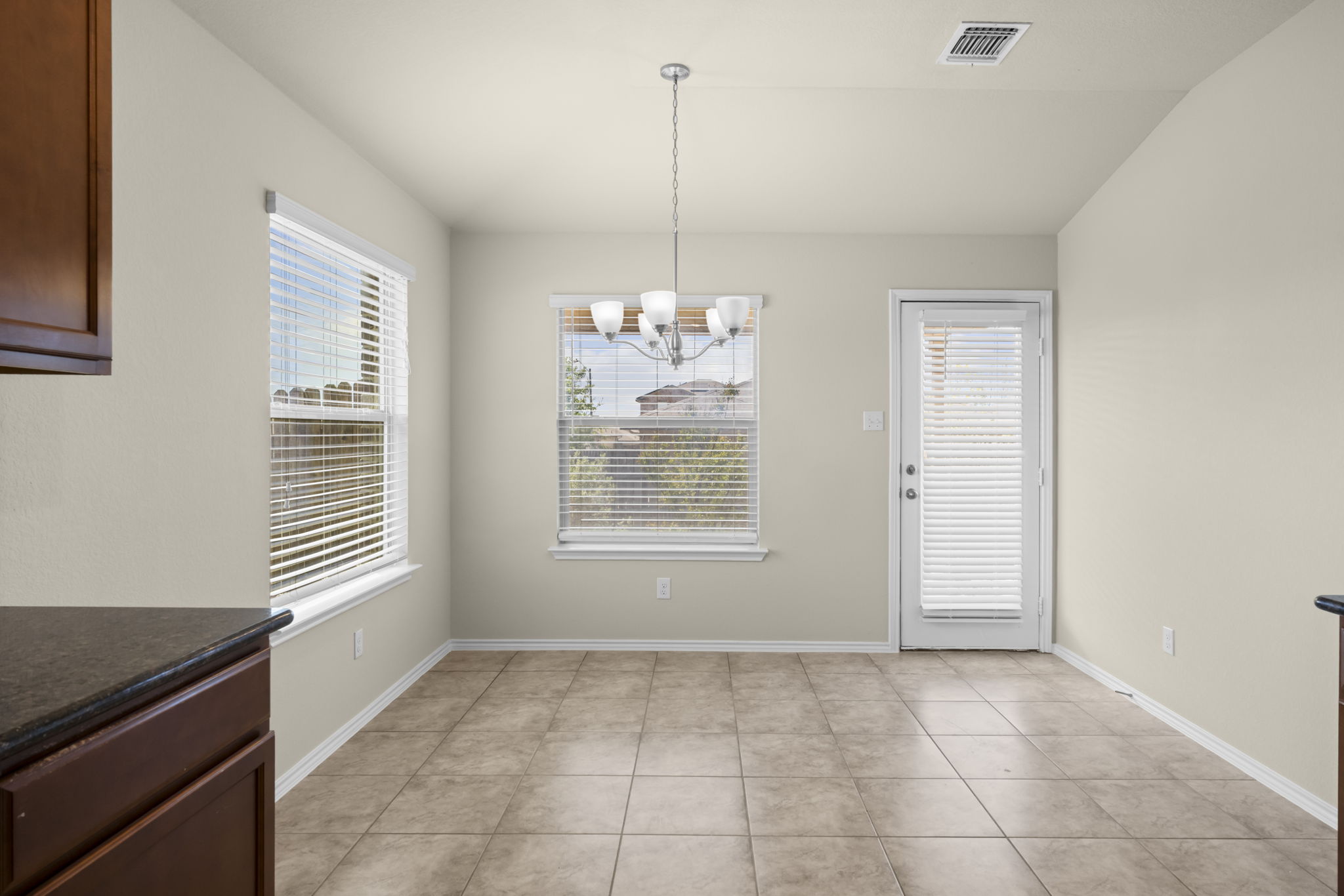 101 Plata Lane Jarrell, TX 76537 - Photo 19 of 27 a view of an empty room with a window