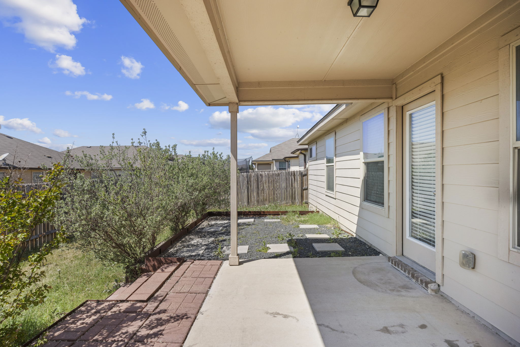 101 Plata Lane Jarrell, TX 76537 - Photo 26 of 27 a view of a backyard with pathway