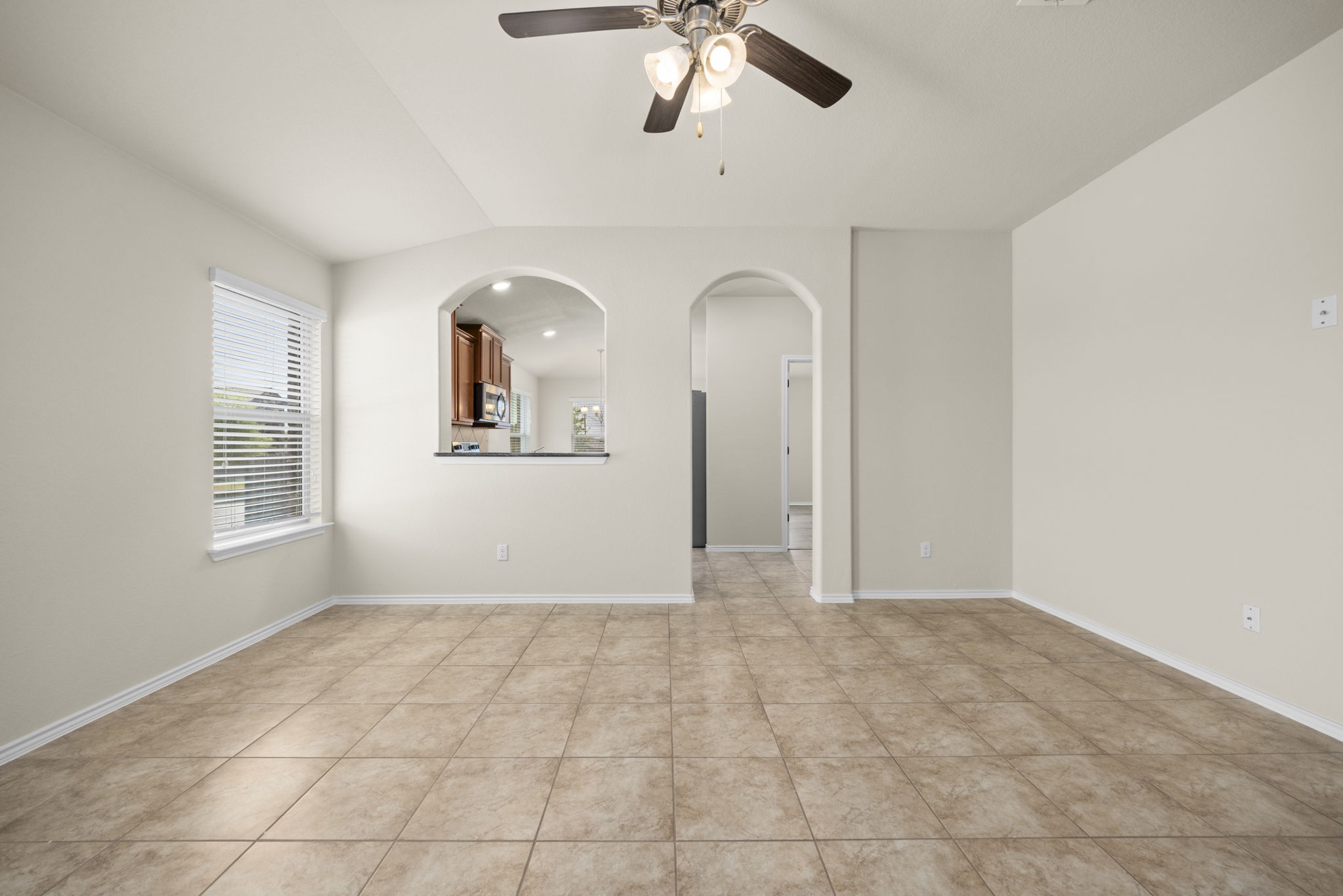 101 Plata Lane Jarrell, TX 76537 - Photo 5 of 27 a view of an empty room with a window