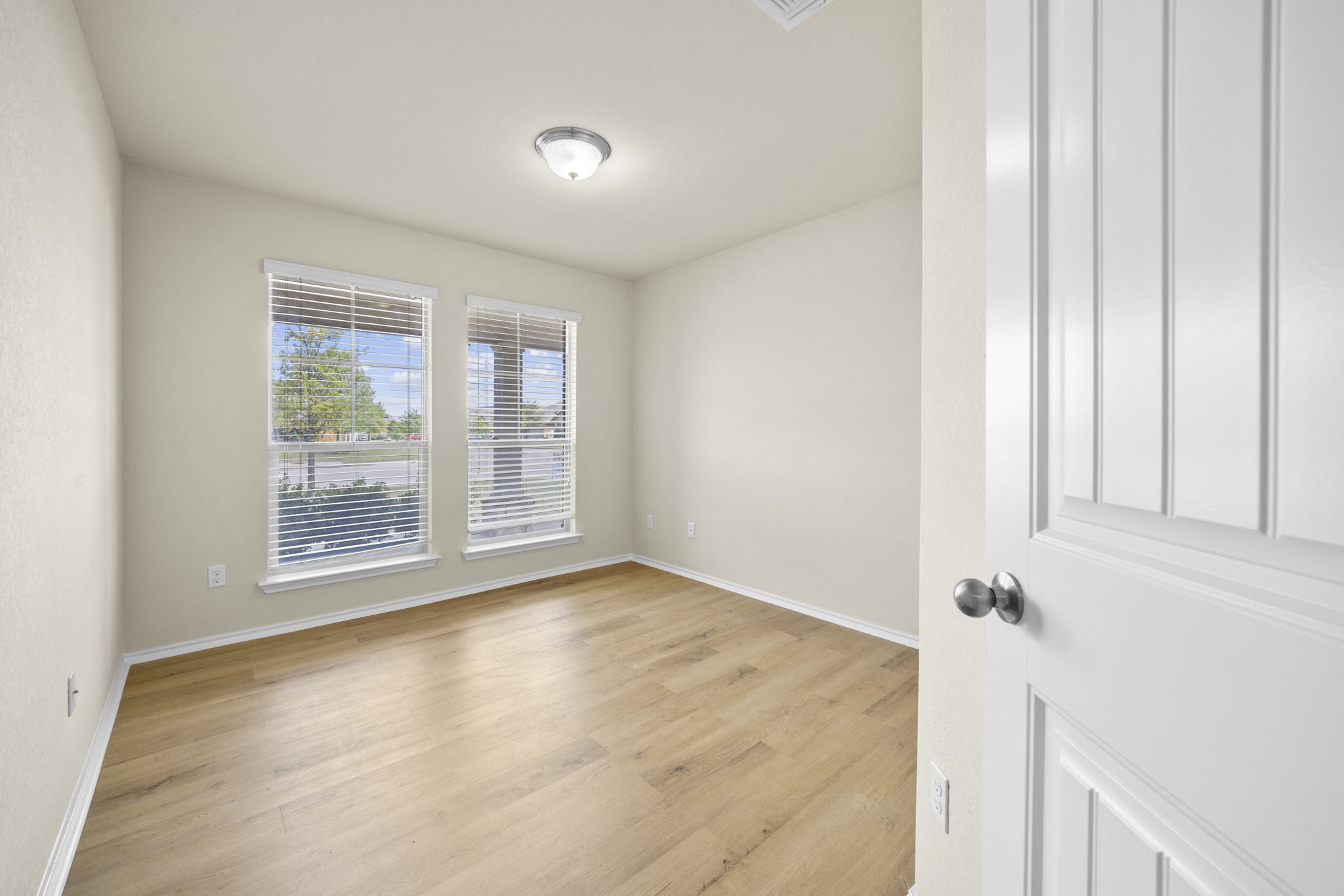 101 Plata Lane Jarrell, TX 76537 - Photo 8 of 27 a view of an empty room with a window